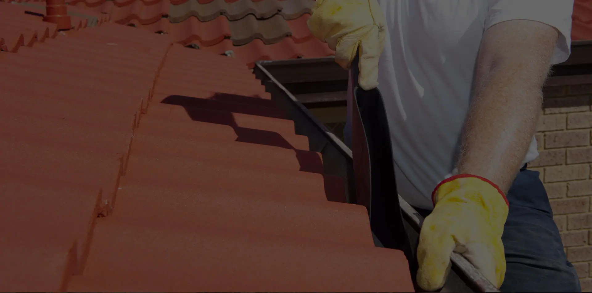 Gutter cleaning on a single storey tiled roof